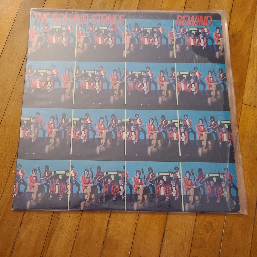 The Rolling Stones Rewind 1971-1984 vintage vinyl record. Black yellow LP FAIR